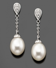 Swinging style you'll always love. These beautiful drop earrings feature cultured freshwater pearls (7.5-8 mm) and diamond accents set in 14k white gold. Approximate drop: 1-1/4 inches.