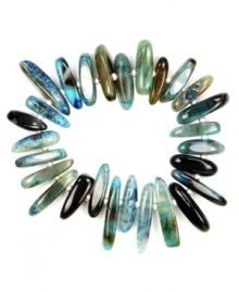 Get back to the basics. Jones New York's serene style features elongated blue agate stones that range in color from light blue to dark brown. Silver-plated mixed metal beads add an element of shine. Bracelet stretches to fit wrist. Approximate diameter: 2-1/4 inches.