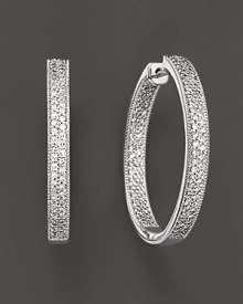 Inside-out earrings, circles with diamonds, are a new twist on the classic hoop.