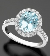 The alluring hue of oval-cut aquamarine (2-1/4 ct. t.w.) is complimented by the sparkling brilliance of round-cut diamond (1/2 ct. t.w.) on this beautiful 14k white gold ring.