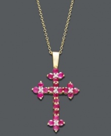 Boldly express your faith. This intricate cross pendant displays round-cut rubies (1-1/6 ct. t.w.) and sparkling diamond accents set in 14k gold. Approximate length: 18 inches. Approximate drop: 1-1/4 inches.