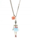 Creepy chic. Betsey Johnson's trendy long pendant features a sailor skeleton dressed in a blue tutu with a red belt. Necklace set in mixed metal with a red flower charm and crystal accents. Approximate length: 26 inches + 3-inch extender. Approximate drop: 4-1/4 inches.