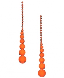 Go bold or go home! Nine West's daring drop earrings feature a glam graduated design highlighting orange plastic beads set in hematite-plated mixed metal. Approximate drop: 3 inches.