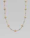 A long glamorous chain bedecked in sparkling stones.Glass Enamel 14k goldplating Chain length, about 41 Imported