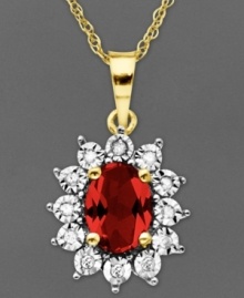 Regal and resplendent. An oval-cut ruby (1-1/8 ct. t.w.) and round-cut diamond accents adorn this royalty-inspired pendant. Crafted in 14k gold. Approximate length: 18 inches. Approximate drop: 5/8 inch.