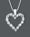 Round-cut diamonds (1/2 ct. t.w.) lend the classic heart shape sparkling whimsy. Set in 14k white gold. Chain measures 18 inches.