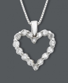 Round-cut diamonds (1/2 ct. t.w.) lend the classic heart shape sparkling whimsy. Set in 14k white gold. Chain measures 18 inches.