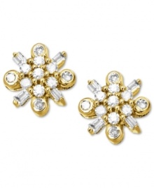 Springtime sparkle. These luminous stud earrings feature round and baguette-cut diamonds (1/4 ct. t.w.) in the shape of flowers. Set in 14k gold. Approximate diameter: 2/5 inch.