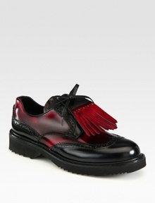 Bi-Color spazzolato lace-up design with wingtip detail and removable kiltie. Foam heel, 1¼ (30mm)Foam platform, ½ (15mm)Compares to a ¾ heel (20mm)Leather upperLeather liningRubber solePadded insoleMade in Italy