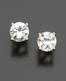 Look (and feel!) like a million dollars. These classic stud earrings feature round-cut white sapphires (2 ct. t.w.) set in 14k gold.