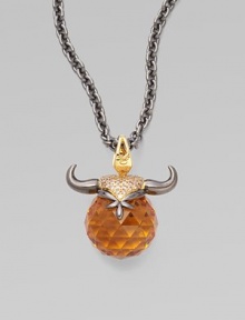 A goldplated and black rhodium plated sterling silver bull horns, complete with pavé cubic zirconia, looms over a topaz crystal, strung on a long elegant chain.Topaz crystal Cubic zirconia Goldplated sterling silver Black rhodium plated sterling silver Chain length, about 30 Pendant width, about 1½ Lobster clasp Imported