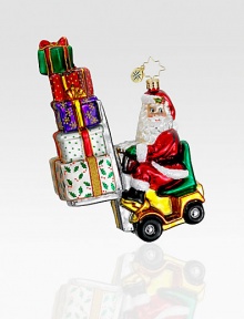 The elves need some help this year and Santa knows exactly what will do the job: A festive forklift! Hand-blownHand-painted6½ tallMade in Poland