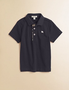 The beloved classic, in airy pique with woven check trim.Ribbed polo collar Short sleeves Front button placket with woven check trim Embroidered chest logo Cotton; machine wash Imported Please note: Number of buttons may vary depending on size ordered. 