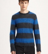 Offering cozy style, a boldly striped sweater made from a mohair blend.Allover stripesPull-on style70% mohair/30% nylonDry cleanImported