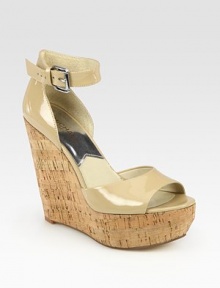 Sleek patent leather accompanies a natural cork wedge while an adjustable ankle strap holds the foot in place. Cork wedge, 5 (125mm)Cork platform, 1½ (40mm)Compares to a 3½ heel (90mm)Patent leather upperLeather lining and solePadded insoleImported