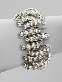 Bold, open arcs set with shimmering faceted Swarovski crystals.CrystalSilverplatedWidth, about 1Length, about 6½Hidden magnetic claspMade in Italy