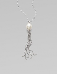 A baroque pearl with a sterling silver tassel on a sterling silver chain. 16mm baroque white organic man-made pearl Length, about 36 Sterling silver Lobster clasp closure Imported 