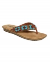 Bring easy Southwestern-inspired style to your summer looks with the colorful beading of the ultra-comfortable Marin thong sandals by Minnetonka.