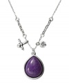 A berry beautiful accessory. This Fossil necklace features a teardrop-shaped purple-dyed jade stone with bee and crystal charms. Crafted in silver tone mixed metal. Approximate length: 16 inches + 2-inch extender. Approximate drop: 3/4 inch.