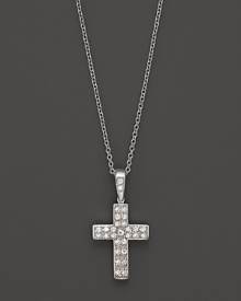 Petite diamond pavé-set cross pendant set in 14K. white gold.