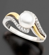 The simplicity of a stunning cultured freshwater pearl (7 mm) beautifully contrasts with an elegant setting of sterling silver, 14k gold and round-cut diamond accents on this lovely ring.