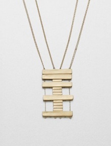 A geometric design featuring a long pendant consisting of stacked bars with spacers on link chains. Brass barsGold-filled chainLength, about 36Pendant size, about 2Slip-on styleMade in USA