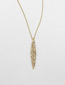 From the Miss Havisham Collection. A long tapered pendant, pointed like a spear, is dappled with dazzling Swarovski crystals and hangs from a delicate chain.CrystalGoldtoneLength, about 16 plus 3 extenderLobster claspMade in USA