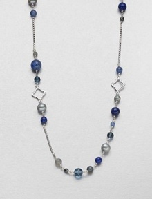 From the Bijoux Collection. A beautiful mix of semi-precious beads and sterling silver clover links on a long box link chain.Blue topaz, gray moonstone, gray cultured pearl, kyanite, lapis, labradorite, hematite and prasioliteSterling silverLength, about 40Toggle closureImported