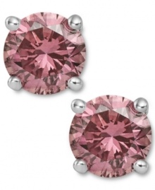 Perfection in pink. These sparkling stud earrings feature round-cut pink diamonds (2 ct. t.w.) in a four-prong setting of 14k white gold. Approximate diameter: 1/3 inch.