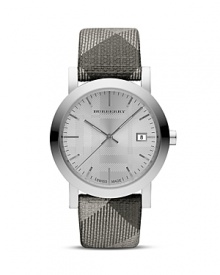 Time check. Show off chic style with this eye-catching timepiece with shimmering checked leather strap from Burberry.