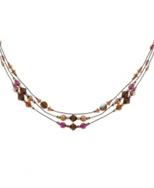 Red alert! A chic combination of crimson-hued crystals make 2028's triple-strand necklace ideally suited for fall fashion. Crafted in copper tone mixed metal and embellished with topaz and aurora borealis beads. Approximate length: 16 inches + 3-inch extender.