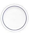 Named for a trendy Copenhagen neighborhood but designed with timeless style, the Christianshavn Blue bread and butter plate features a double band of navy in pristine white porcelain. From Dansk.