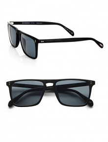 A slim retro style handcrafted in thin, polished plastic with a modified square shape and silver pin accents on the frame and temples. Available in semi matte black frames with indigo photochromic lenses.Acetate100% UV ProtectionImported