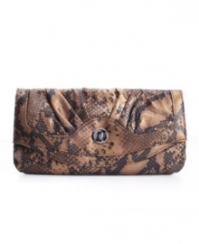 A slim clutch in a snakeskin print livens up nighttime looks or adds a ultra chic note for day, by Style&co.