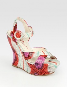 Textural snake print in a vibrant, multicolored design, joined by curvy leather straps and an adjustable ankle strap. Self-covered wedge, 5 (125mm)Covered platform, 1½ (40mm)Compares to a 3½ heel (90mm)Snake-print leather upperLeather lining and solePadded insoleImportedOUR FIT MODEL RECOMMENDS ordering one half size up as this style runs small. 