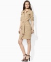 Designed in a crisp cotton blend, this Lauren by Ralph Lauren shirtdress exudes casual sophistication with a cinched belted waist and versatile roll-tab sleeves.