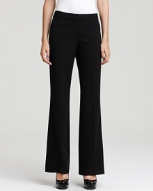 A straight leg with sharp creasing creates a timeless silhouette on these T Tahari pants.