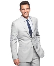 Update your dresswear collection with the modern cut of this slim-fit gray blazer from Alfani RED.