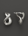 With a languid twist, a foldover hoop earring in polished 14 Kt. white gold.