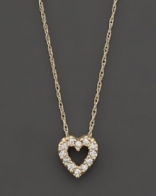 A beautiful diamond heart pendant in 14 Kt. yellow gold, with rope chain.