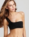 Becca® by Rebecca Virtue adds texture and dimension to a basic black bikini with draped macrame detailing. A one shoulder silhouette is modern and flattering.