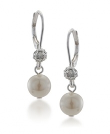 Embrace elegance and sophistication with traditional style. Carolee's petite earrings feature delicate glass pearls and crystal fireballs crafted in mixed metal. Approximate drop: 1/8 inch.