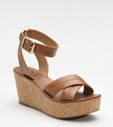 Exotic looking, snake-embossed leather crisscrosses the toes, wraps the ankle and sits on a cork wedge.Cork heel, 3 (75mm) Cork platform, 1½ (40mm) Compares to a 1½ (40mm) Buckle ankle strap Leather lining Rubber sole Imported