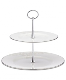 Refine your formal table with classic cream and white. Trimmed in platinum and accented with a raised dot and scroll pattern, this Opal Innocence Scroll server from Lenox brings contemporary grace to special occasions. A pearlized finish adds subtle shimmer.