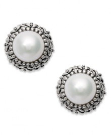 Dedicated to elegance. These beautiful cultured freshwater pearl earrings (8-1/2-9 mm) sit in an intricately-engraved sterling silver setting. Approximate diameter: 6/8 inch.