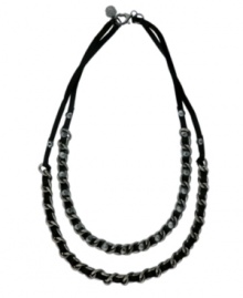 Life on the edge: let your look say it all. Vince Camuto's rock-inspired two-row necklace channels plenty of attitude with woven leather accents in a hematite tone mixed metal chain setting. Approximate length: 20 inches.