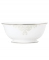 Refine your formal table with classic cream and white Lenox dinnerware. Dishes, including this Opal Innocence Scroll bone china serving bowl, are trimmed in platinum and accented with a raised dot and scroll pattern, bringing contemporary grace to special occasions. A pearlized finish adds subtle shimmer. Qualifies for Rebate