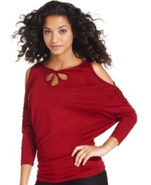 Fashion-forward with all the comforts of soft jersey fabric--Studio M's top features cutout details at the shoulders and neck and a striking dolman sleeve.