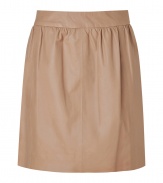 Stylish, lightly pleated skirt in supple, genuine leather - Chic, on-trend macchiato color - Banded waist and back zip - Slim, flattering cut hits above the knee - Ideal for both day and evening - Go for a casual look with a white button down or cashmere pullover and ballet flats - Dress up with a silk top, blazer and platform booties