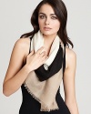 Carry the colorblock trend over to your accessories with this beautiful wool scarf from Echo.